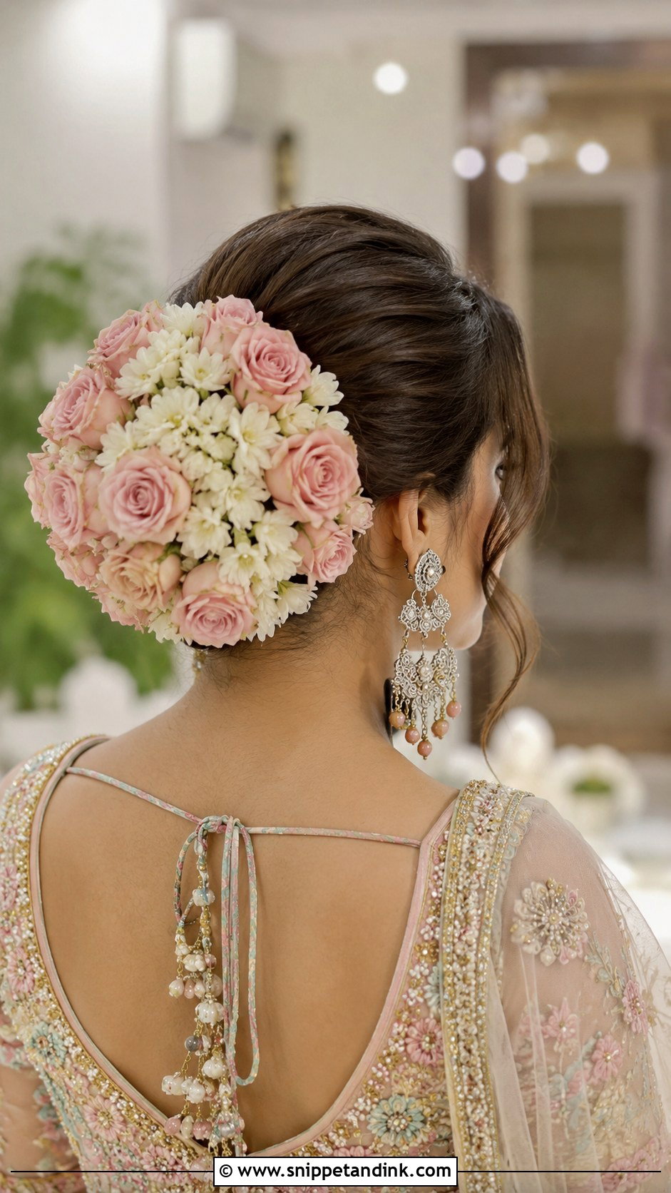 Floral Bun With Roses And Mogra - Snippet and Ink - 20 Indian Hair Styles for Weddings