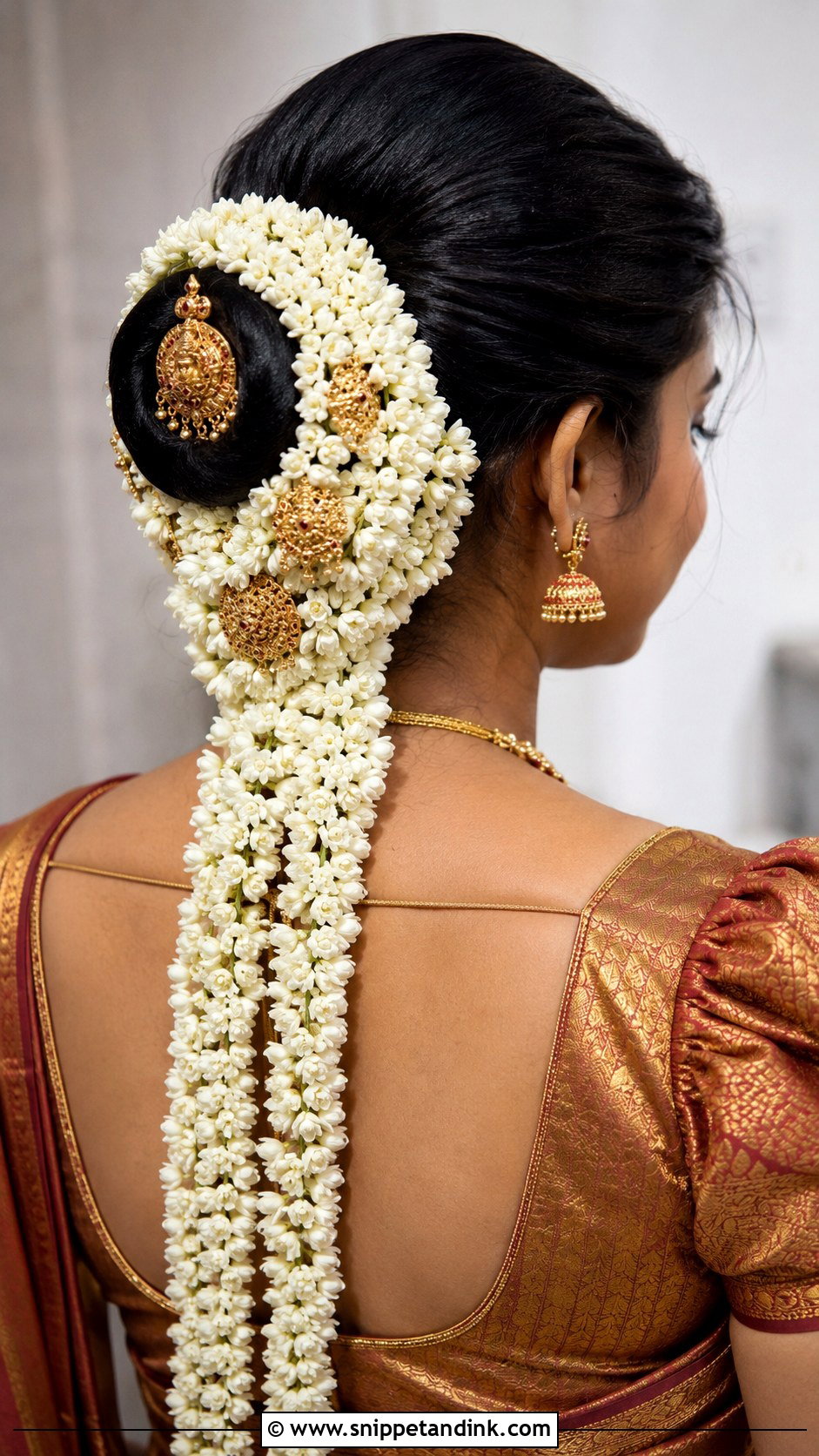 Floral Bun With Trailing Veni - Snippet and Ink - 25 Hindu Bride Hairstyle Ideas