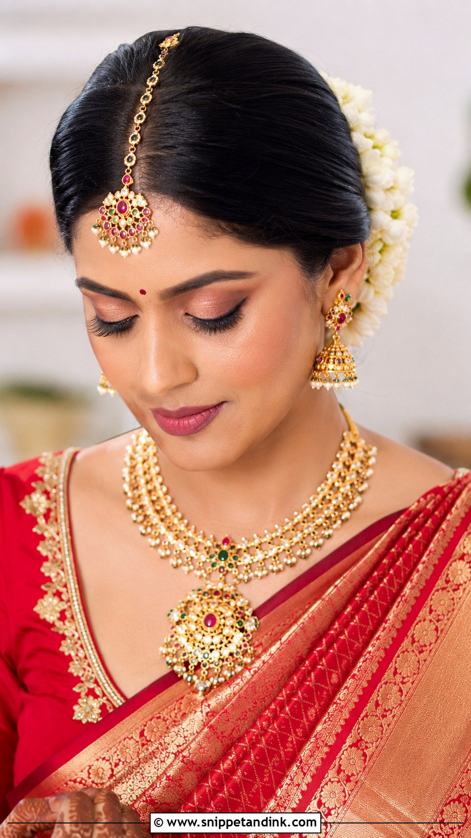 Floral Maang Tikka Bun - Snippet and Ink - 30 Indian Bridal Hairstyles