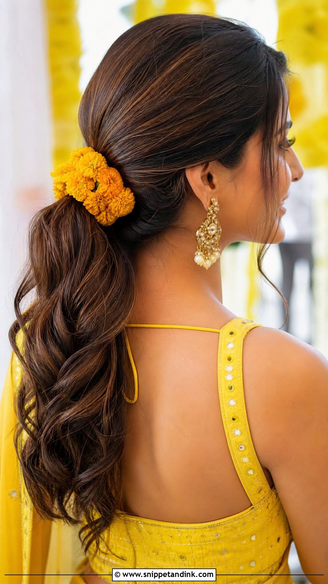Floral Ponytail With Soft Waves - Snippet and Ink - 20 Haldi Bridal Hairstyle Ideas