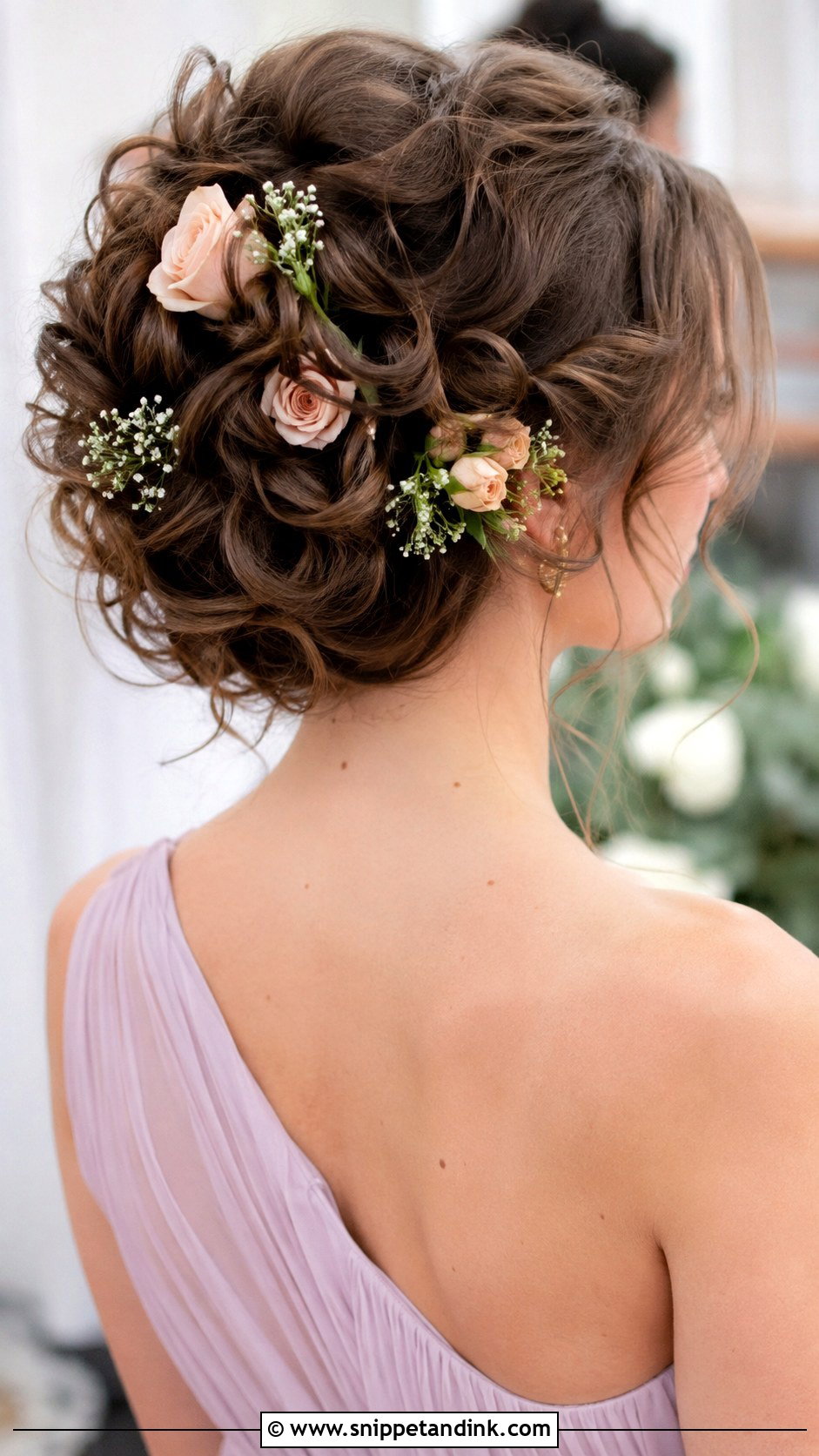 Flower Adorned Updo - Snippet and Ink - 20 Wedding Party Hairstyles for Long Hair