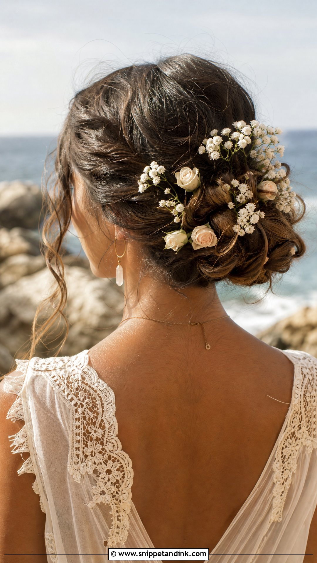 Flower Adorned Updo - Snippet and Ink - 20 Beach Wedding Guest Hair Ideas