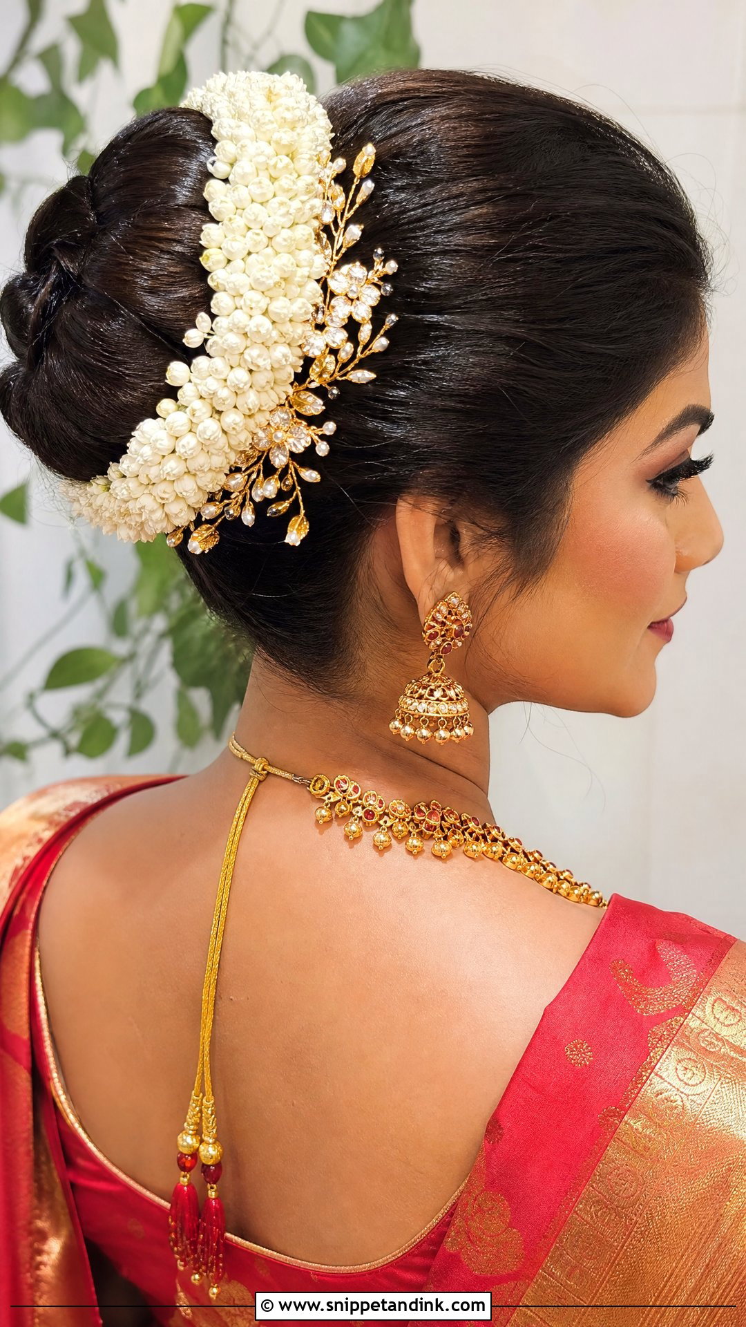 Flower Bun With Gold Leaf Accents - Snippet and Ink - 20 South Indian Bridal Hair Ideas