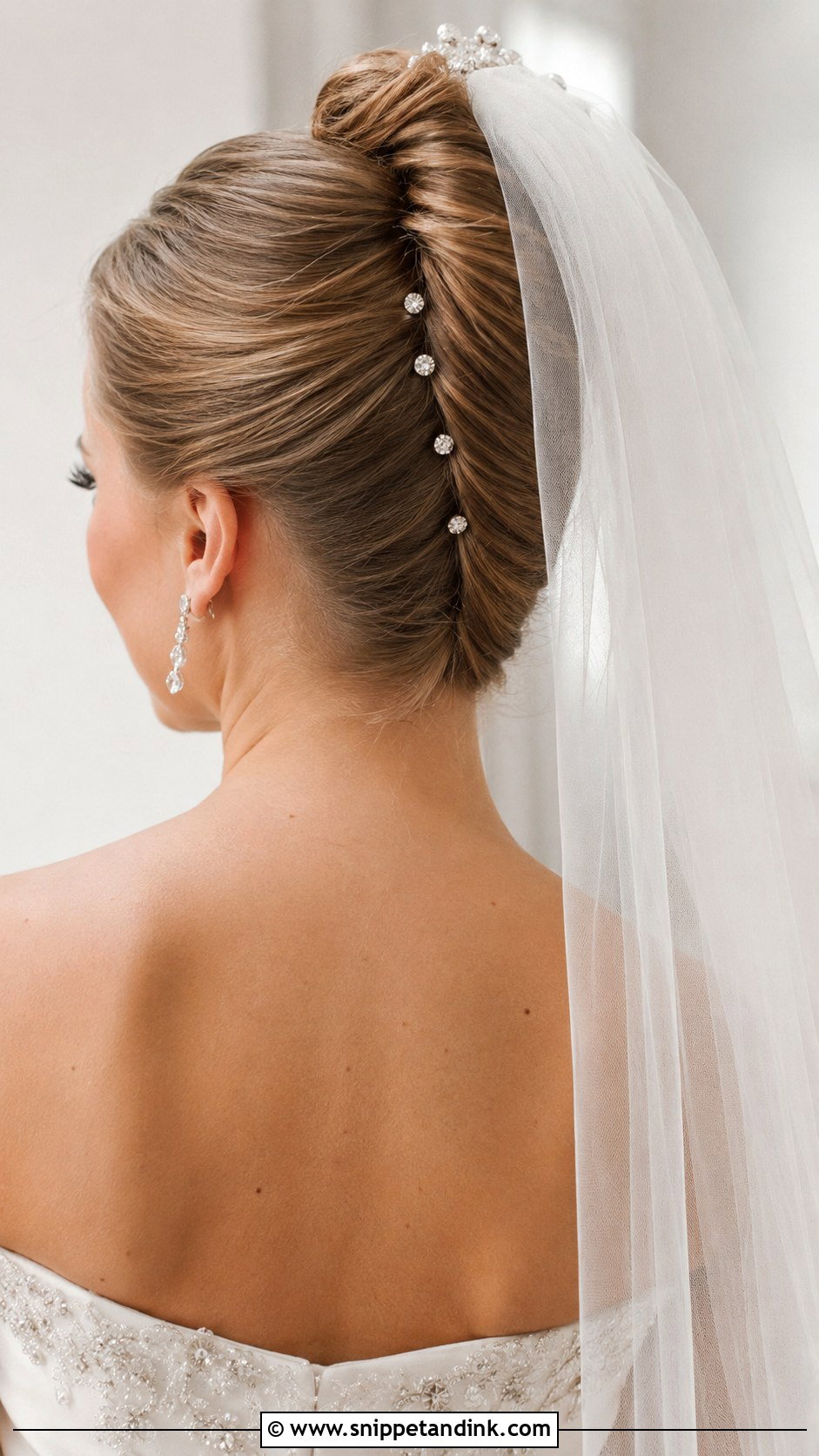 French Twist With Veil - Snippet and Ink - 25 Christian Bridal Hairstyle Ideas
