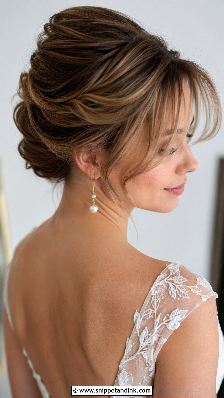 French Twist With Wispy Bangs - Snippet and Ink - 30 French Twist Wedding Hair Ideas