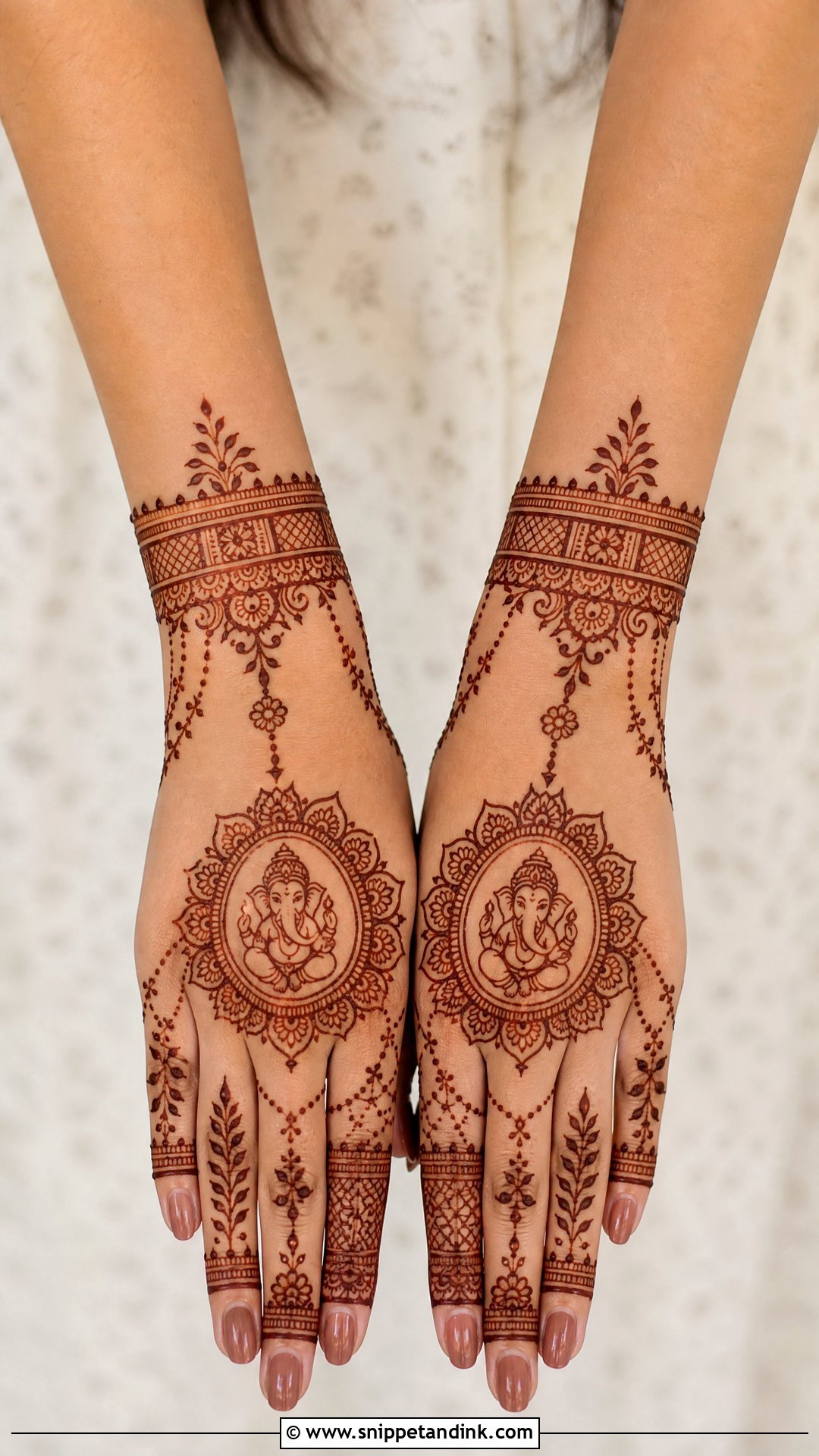 Ganpati Bappa Back Hand Mehndi Design - Snippet and Ink - 20 Ganpati Bappa Mehndi Design Ideas