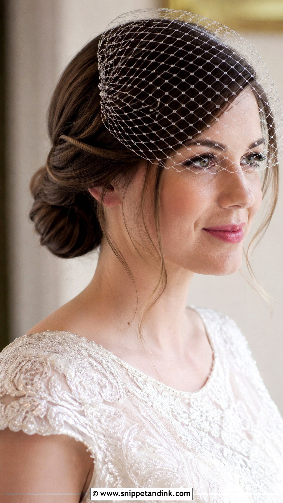 Gibson Tuck Rolled Updo - Snippet and Ink - 20 Old Money Wedding Hairstyles