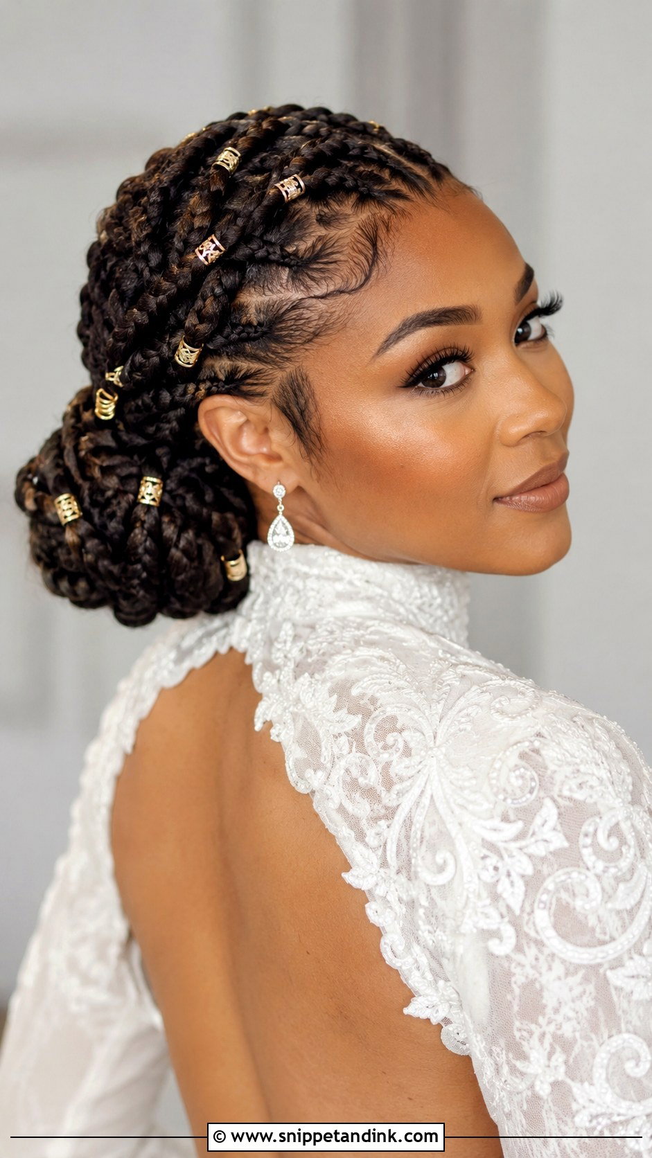 Goddess Braids Low Bun - Snippet and Ink - 20 Afro Wedding Hairstyles Brides
