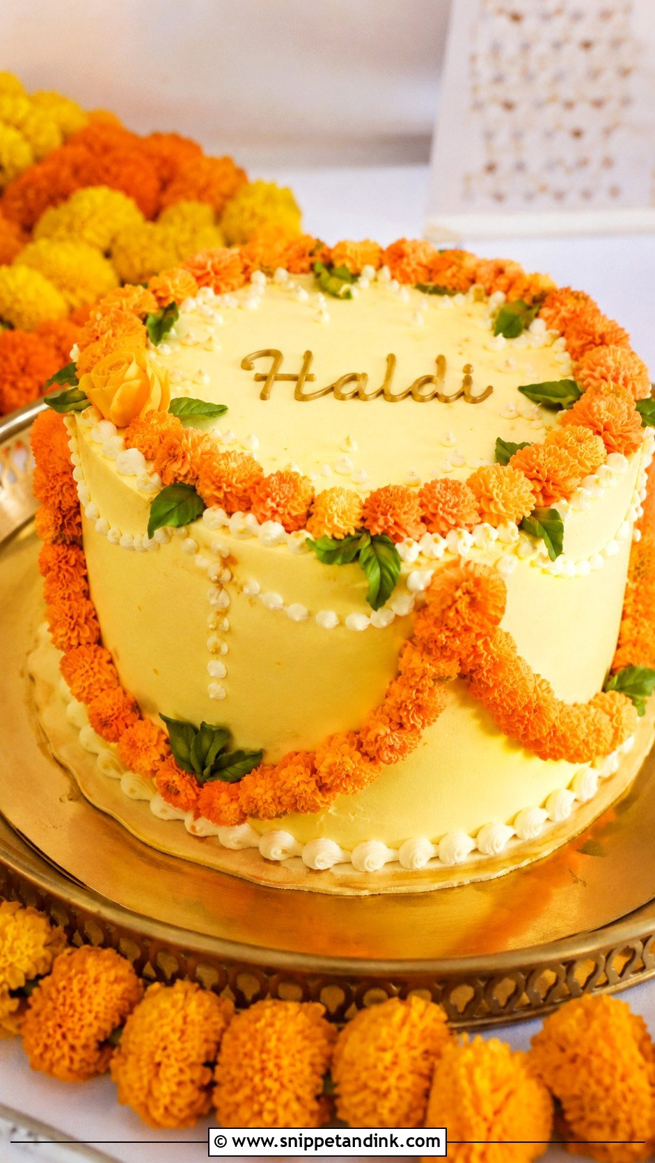 Haldi Cake With Genda Garland - Snippet and Ink - 20 Haldi Cake Ideas