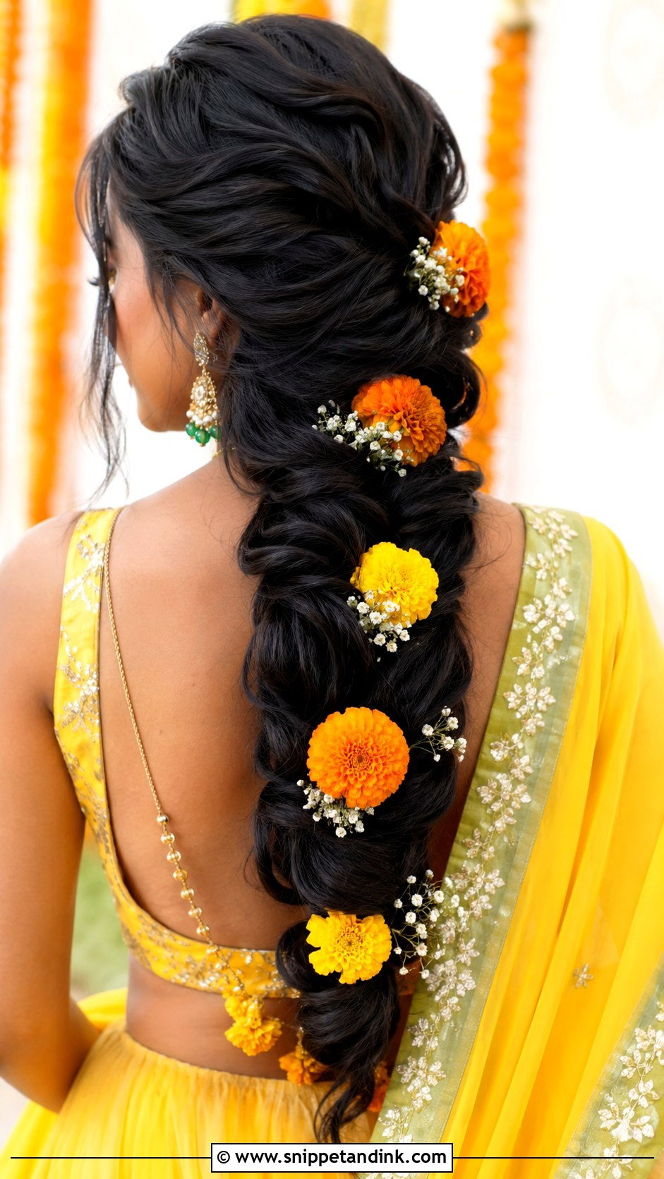Haldi Loose Braid With Marigold - Snippet and Ink - 35 Haldi Hairstyles for Bride