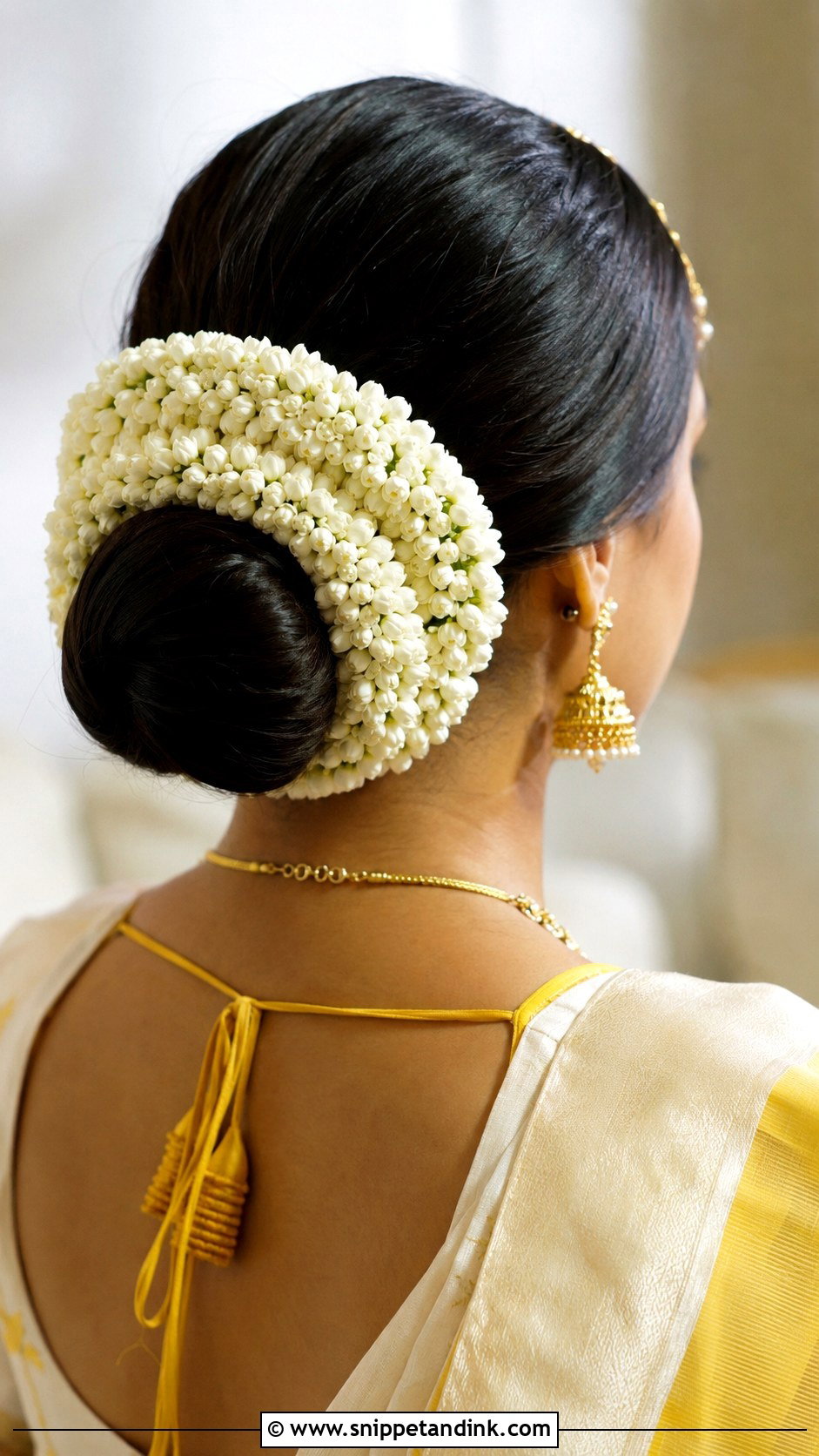 Haldi Low Bun With Gajra - Snippet and Ink - 35 Haldi Hairstyles for Bride