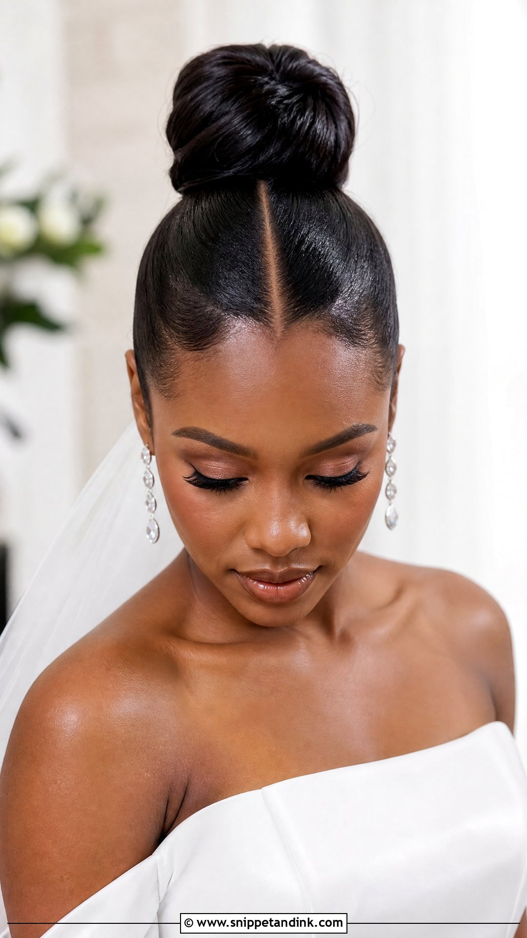 High Ballerina Bun With Center Part - Snippet and Ink - 20 Wedding Bun Hairstyles for Black Women