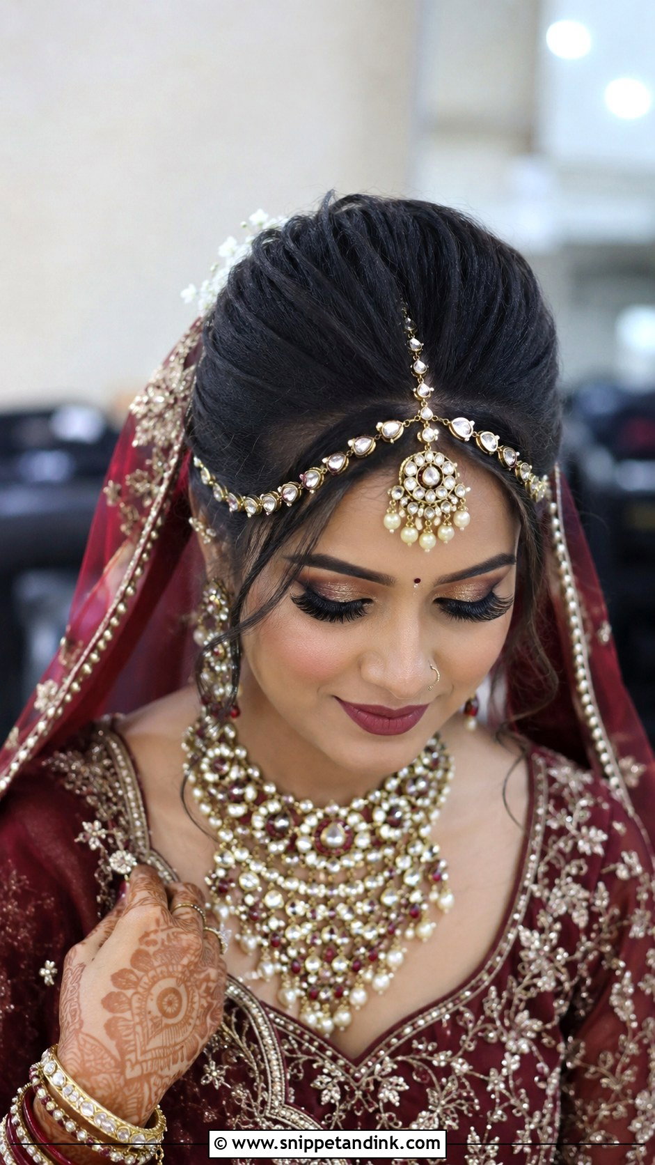 High Bridal Bun With Matha Patti - Snippet and Ink - 15 North Indian Bride Hairstyle Ideas