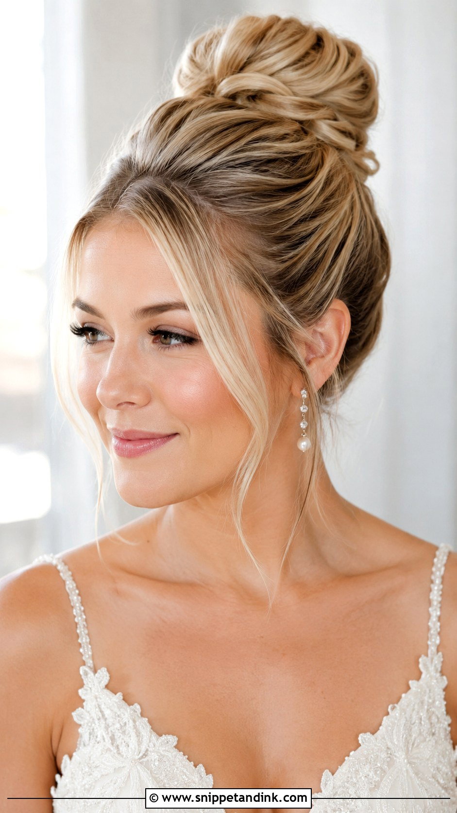 High Bun Updo for Round Faces - Snippet and Ink - 20 Round Face Wedding Hairstyles