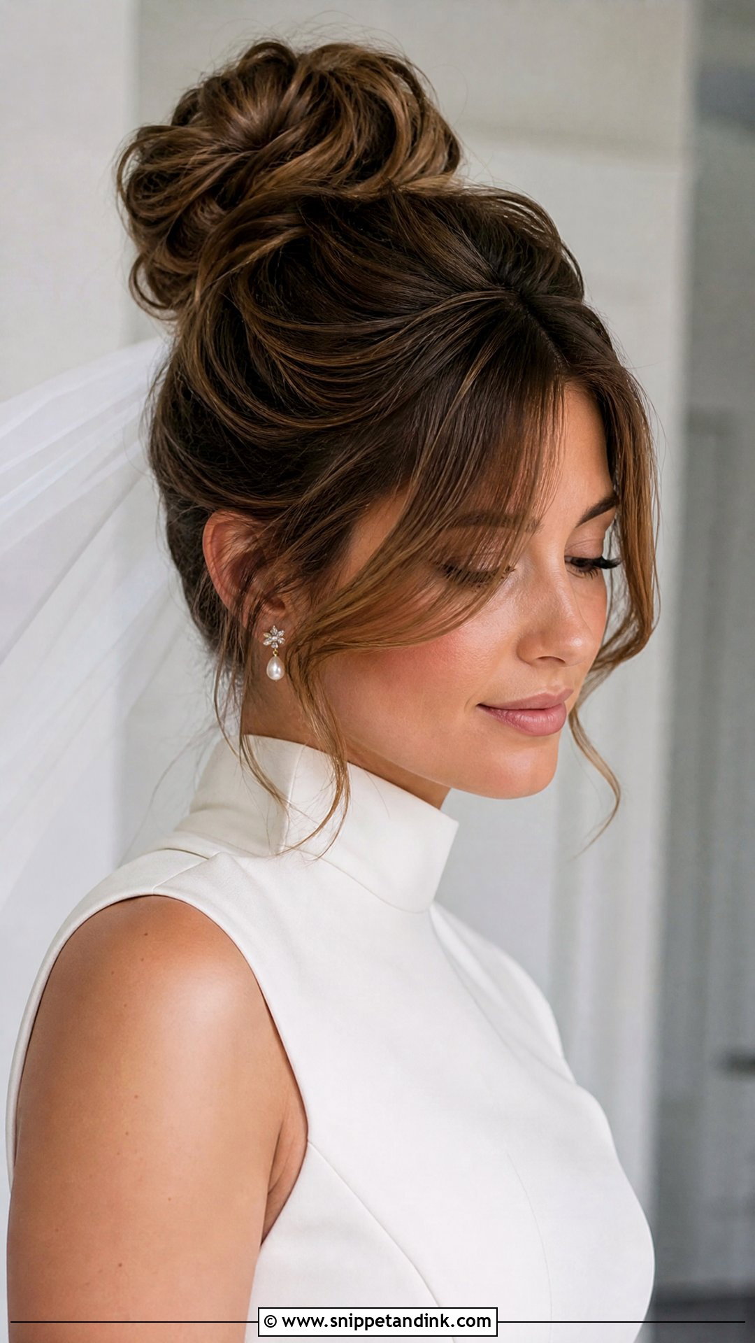 High Bun Wedding Hair With Bangs - Snippet and Ink - 20 Wedding Hairstyle Bangs