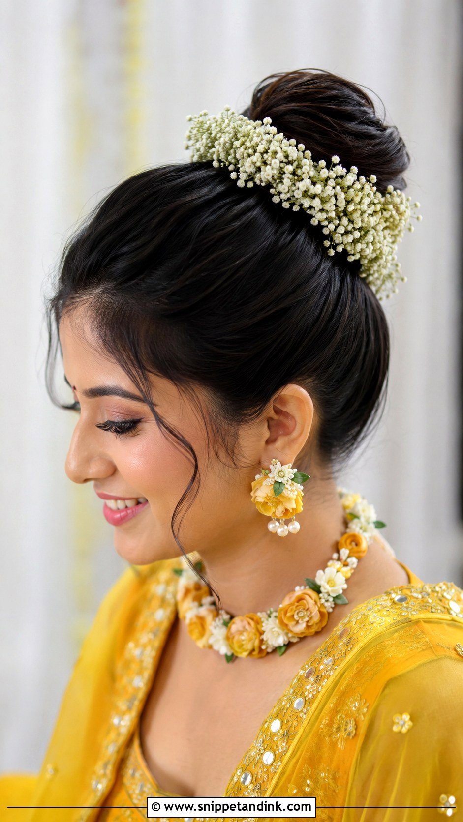 High Bun With Babys Breath - Snippet and Ink - 25 Haldi Bride Hairstyle Ideas
