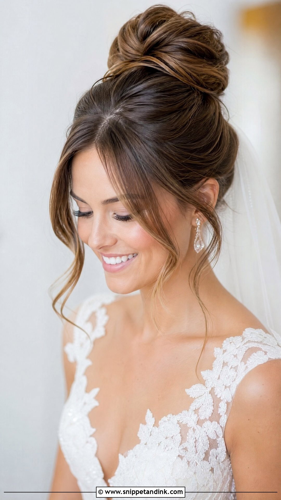 High Bun With Curtain Bangs - Snippet and Ink - 15 Bridal High Bun Hairstyles