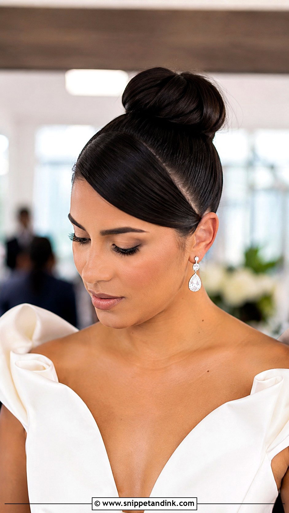High Bun With Deep Side Part - Snippet and Ink - 30 High Bun Wedding Hair Ideas