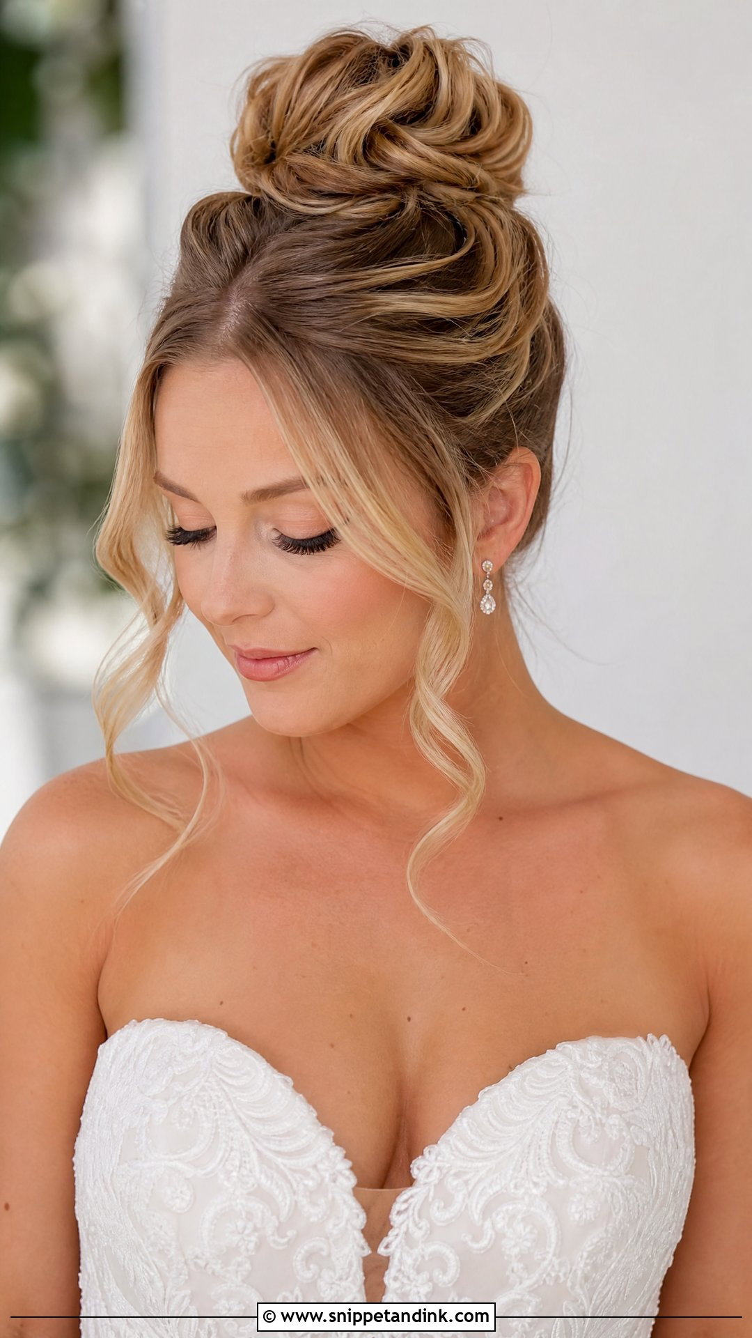 High Bun With Face Framing Tendrils - Snippet and Ink - 20 High Bun Bridal Hair Ideas