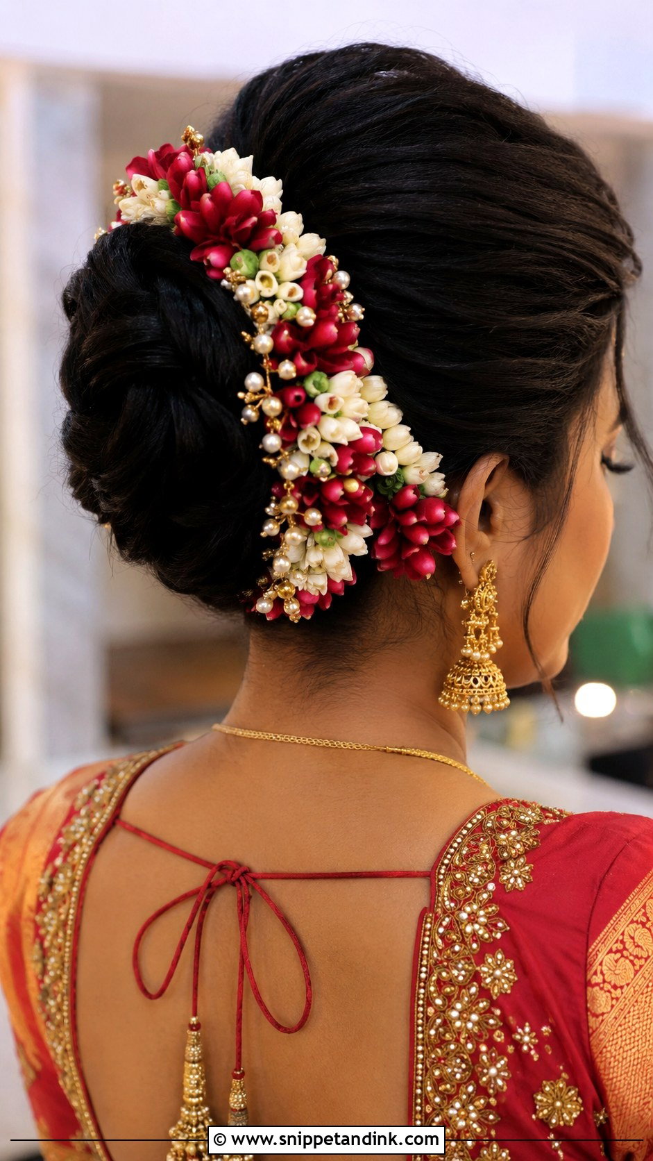 High Bun With Flowers - Snippet and Ink - 35 South Indian Wedding Hairstyles