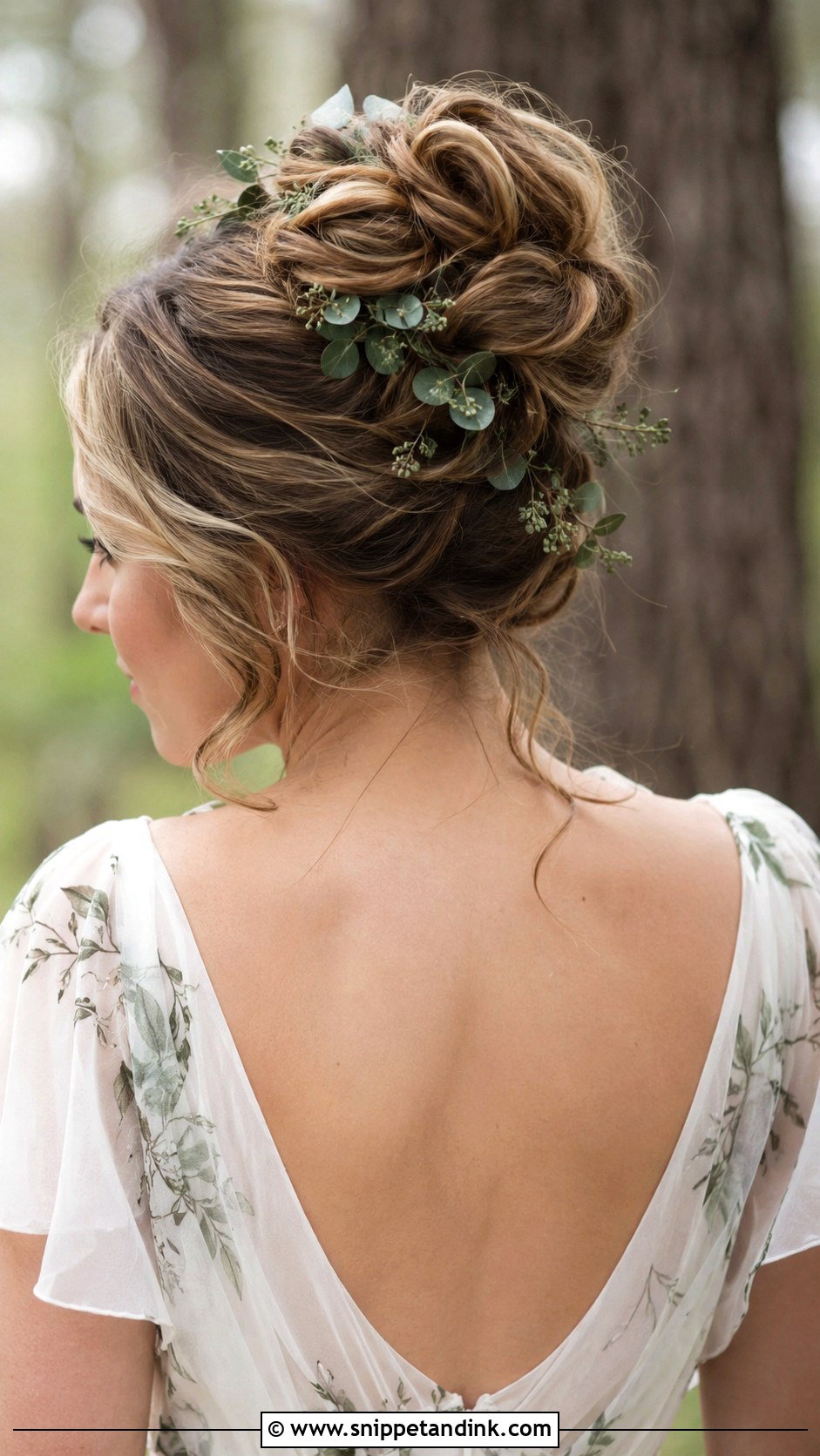 High Bun With Greenery - Snippet and Ink - 30 High Bun Wedding Hair Ideas