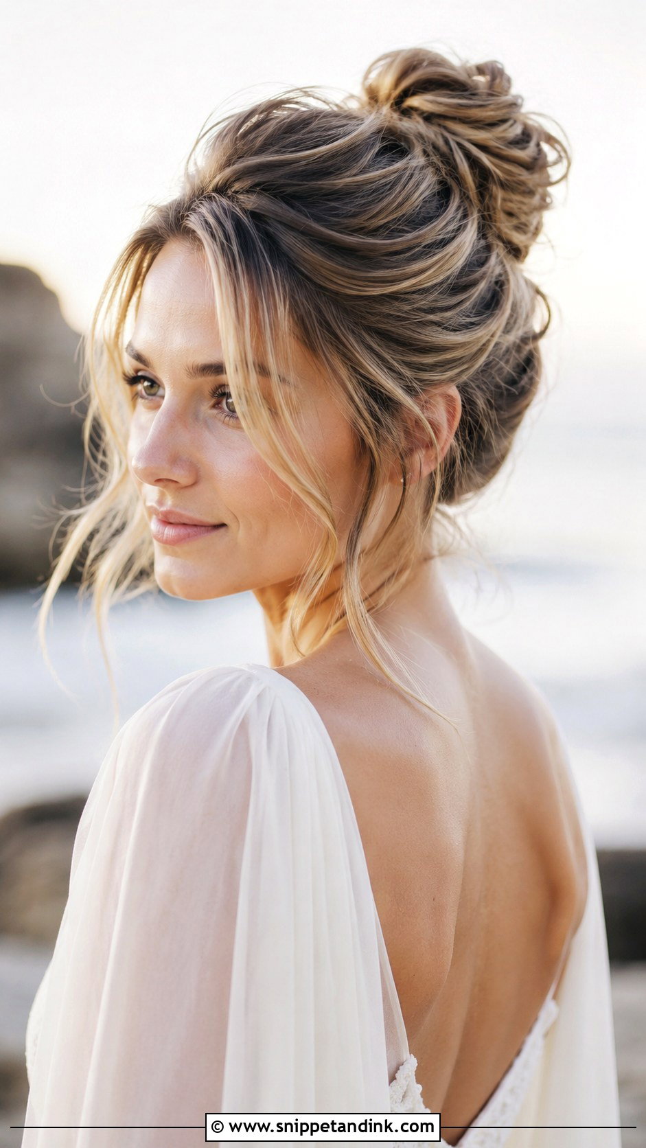 High Bun With Loose Waves - Snippet and Ink - 30 High Bun Wedding Hair Ideas