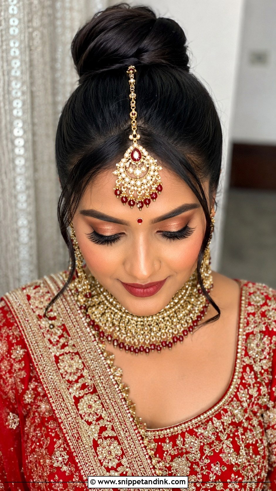 High Bun With Maang Tikka - Snippet and Ink - 20 Indian Bridal Bun Ideas