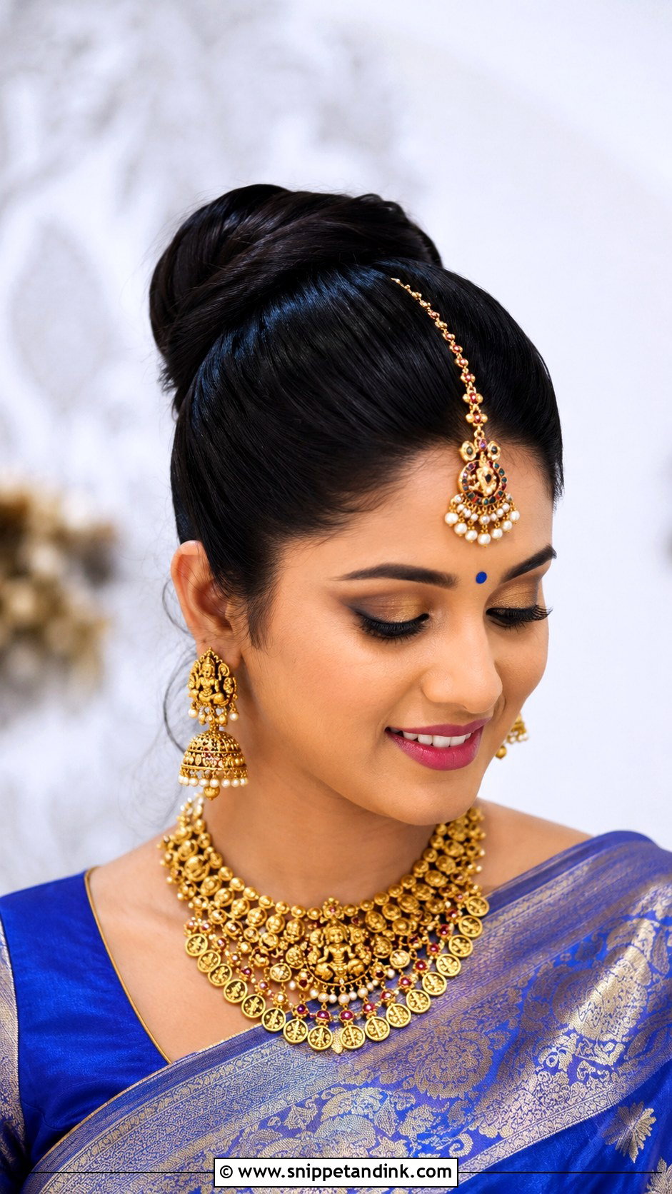 High Bun With Maang Tikka - Snippet and Ink - 20 Desi Bride Hair Ideas