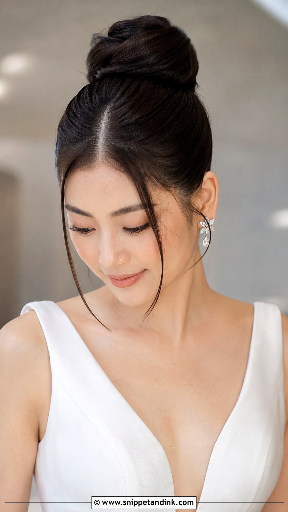 High Bun With Middle Part For Wedding - Snippet and Ink - 20 High Bun Hairstyles for Wedding