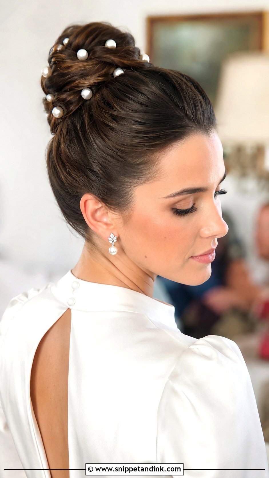 High Bun With Pearl Pins - Snippet and Ink - 30 High Bun Wedding Hair Ideas