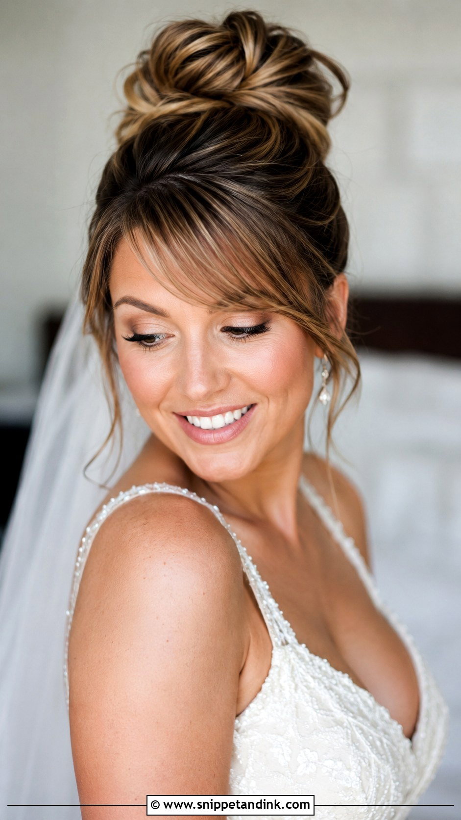 High Bun With Side Swept Bangs - Snippet and Ink - 30 High Bun Wedding Hair Ideas