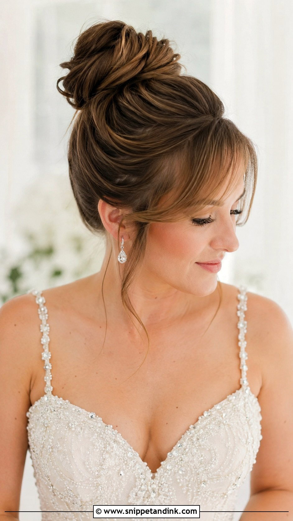 High Bun With Side Swept Bangs - Snippet and Ink - 20 Round Face Bridal Hair Ideas
