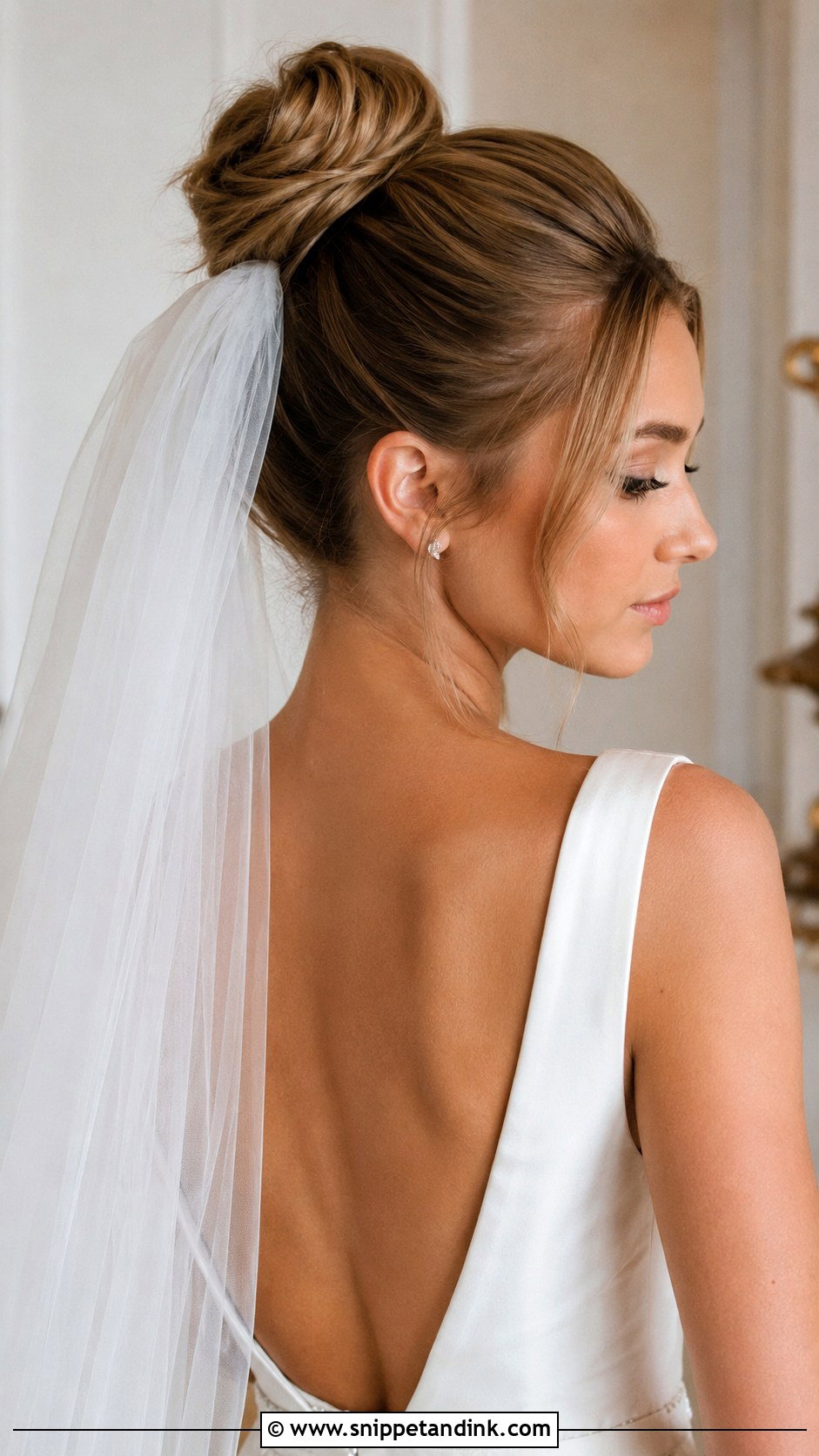 High Bun With Veil - Snippet and Ink - 20 High Wedding Updo Ideas