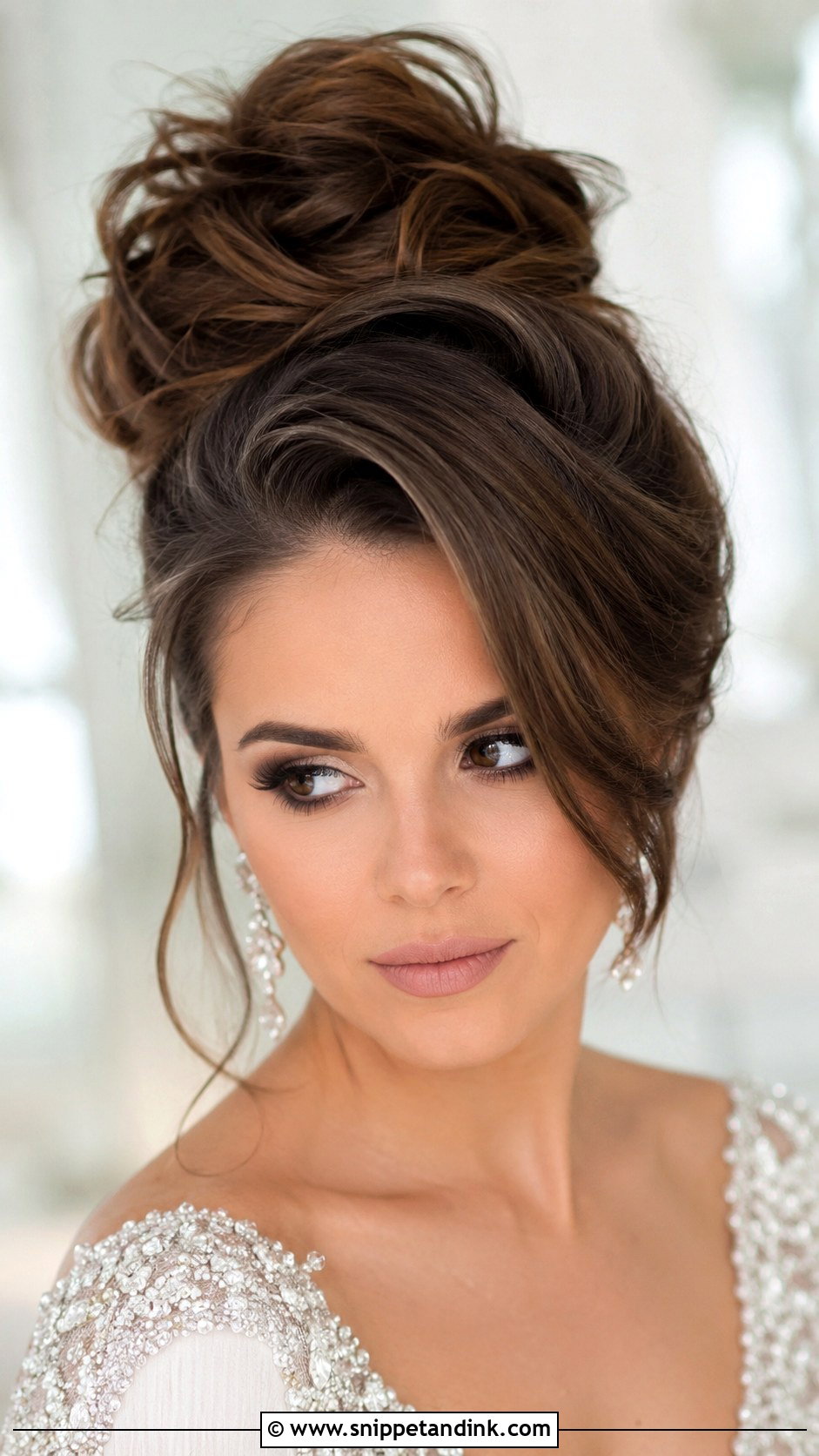 High Messy Bun With Deep Side Part - Snippet and Ink - 25 High Messy Bun Wedding Hair Ideas