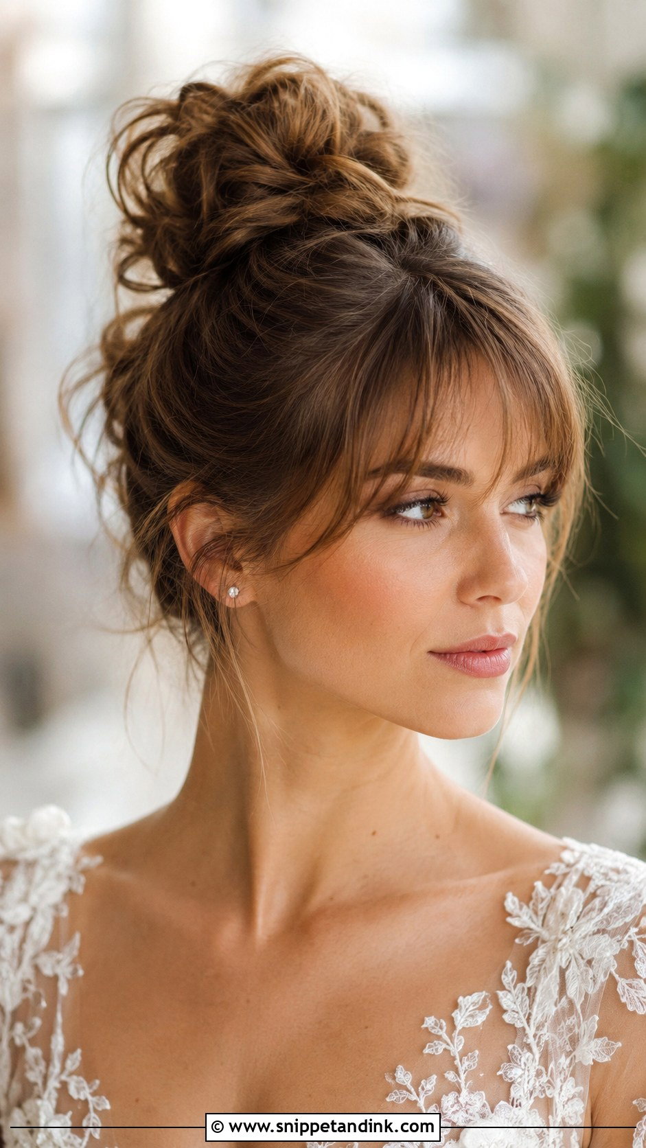 High Messy Bun With Wispy Bangs - Snippet and Ink - 25 High Messy Bun Wedding Hair Ideas