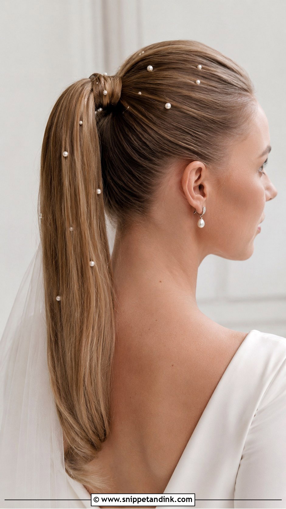 High Ponytail With Pearls - Snippet and Ink - 25 High Ponytail Wedding Hair Ideas