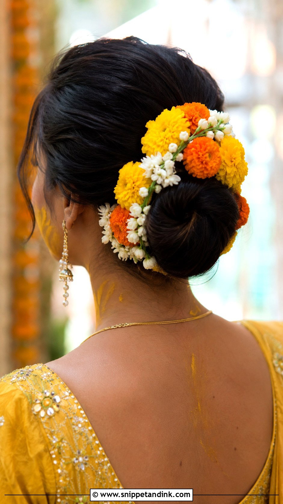 Indian Bridal Bun With Marigold Flowers - Snippet and Ink - 15 Indian Bridal Bun with Flowers Ideas