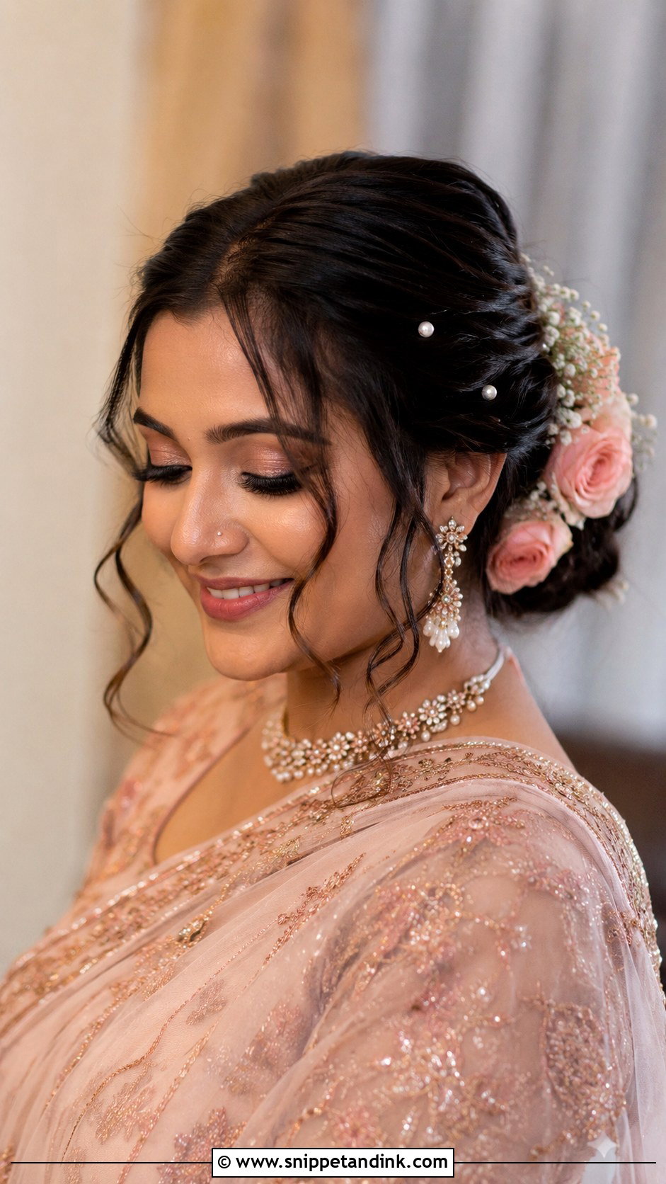 Indian Bridal Low Bun With Face Framing Curls - Snippet and Ink - 20 Indian Wedding Bridal Front Hairstyle Ideas