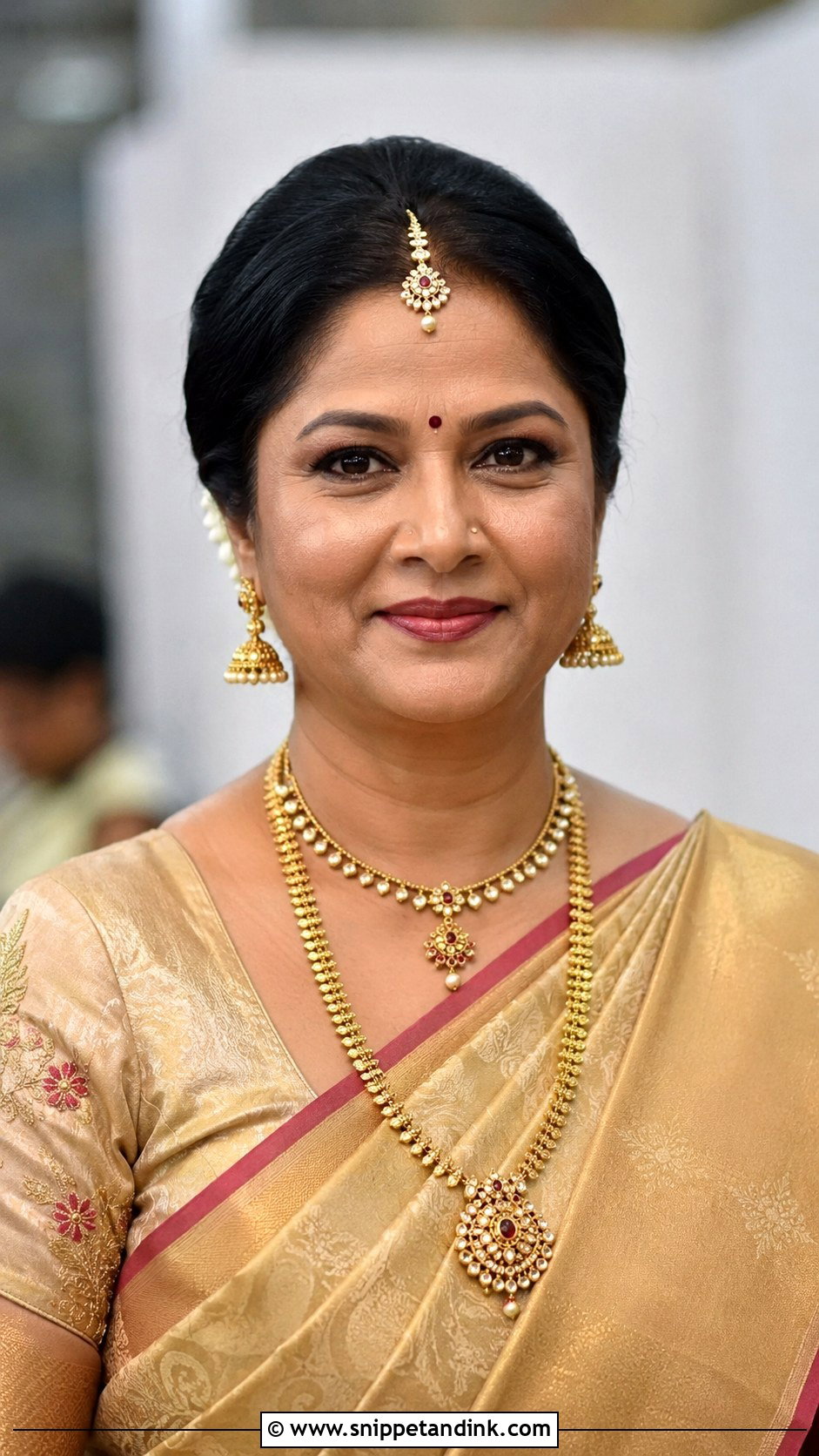 Indian Groom Mother Center Part Bun - Snippet and Ink - 15 Indian Groom Mother Hairstyle Ideas
