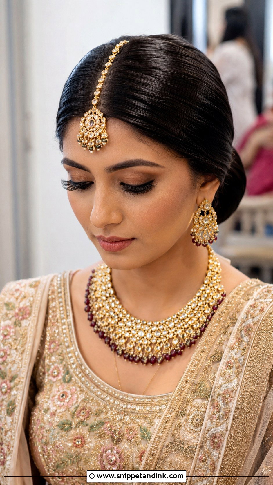Indian Wedding Center Part Bun With Maang Tikka - Snippet and Ink - 20 Front Look Hairstyle for Indian Wedding Ideas