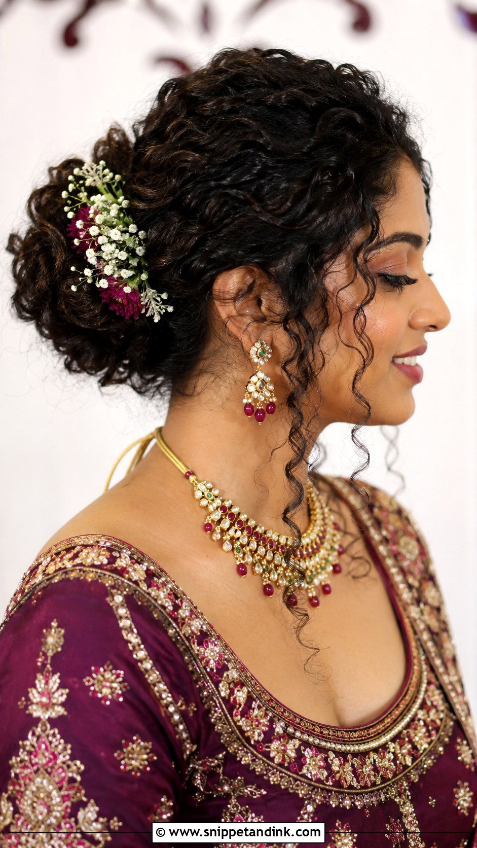 Indian Wedding Curly Hair Bun With Front Tendrils - Snippet and Ink - 20 Front Look Hairstyle for Indian Wedding Ideas