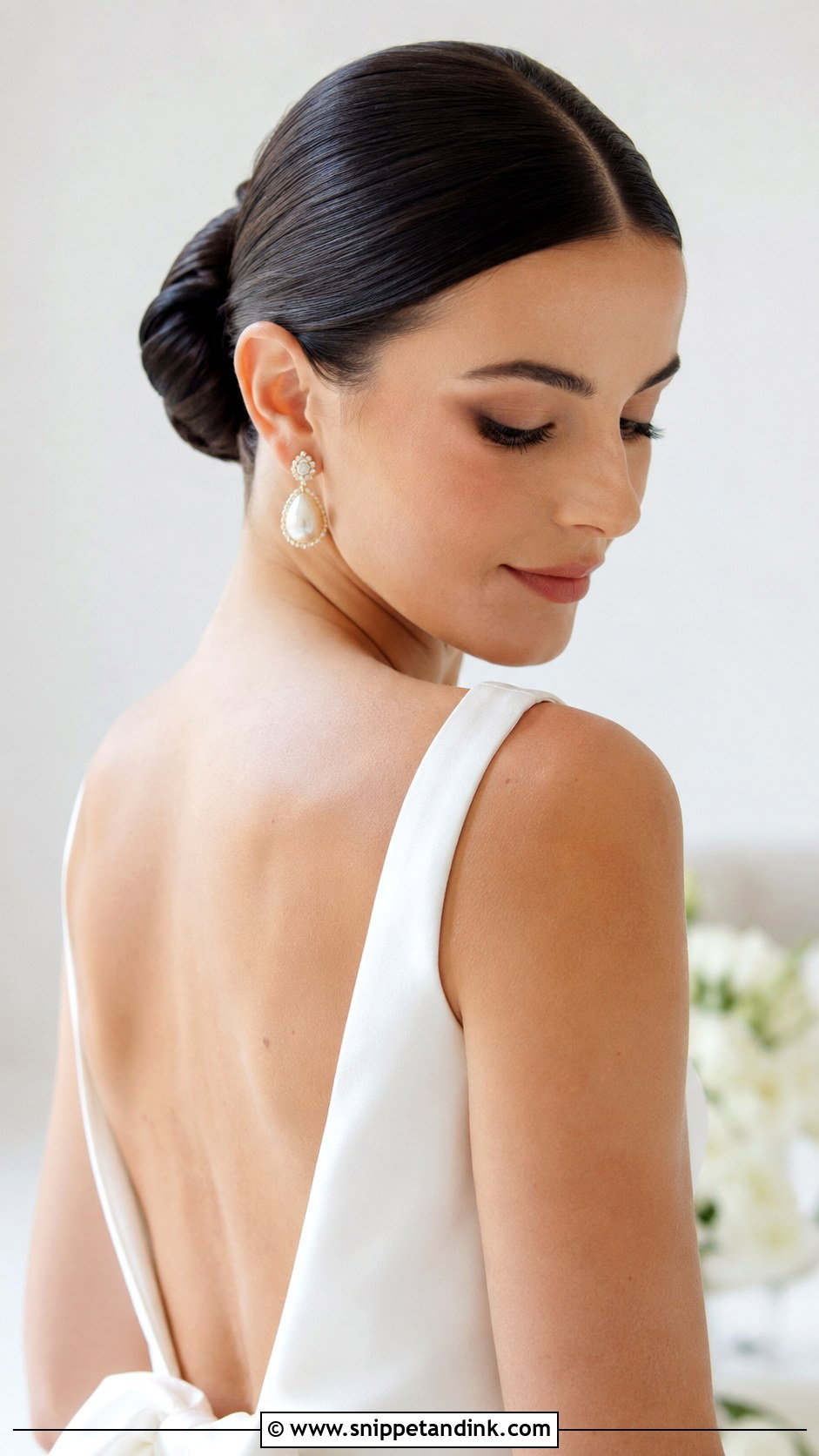 Italian Wedding Sleek Bun - Snippet and Ink - 15 Italian Wedding Hairstyles