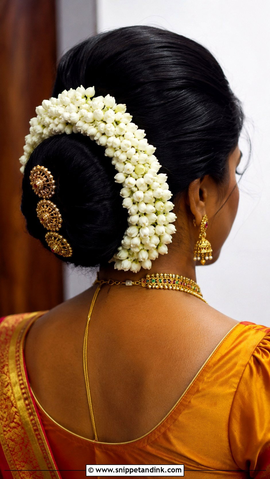 Jasmine Flower Adorned Bun - Snippet and Ink - 25 Asian Wedding Hairstyles