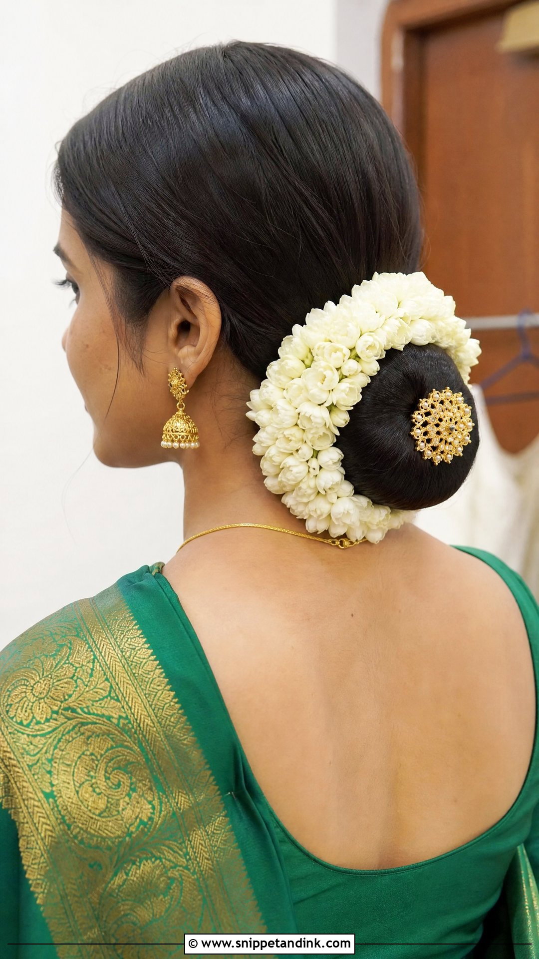 Jasmine Flower Bun at the Nape - Snippet and Ink - 20 South Indian Wedding Hairstyles for Long Hair