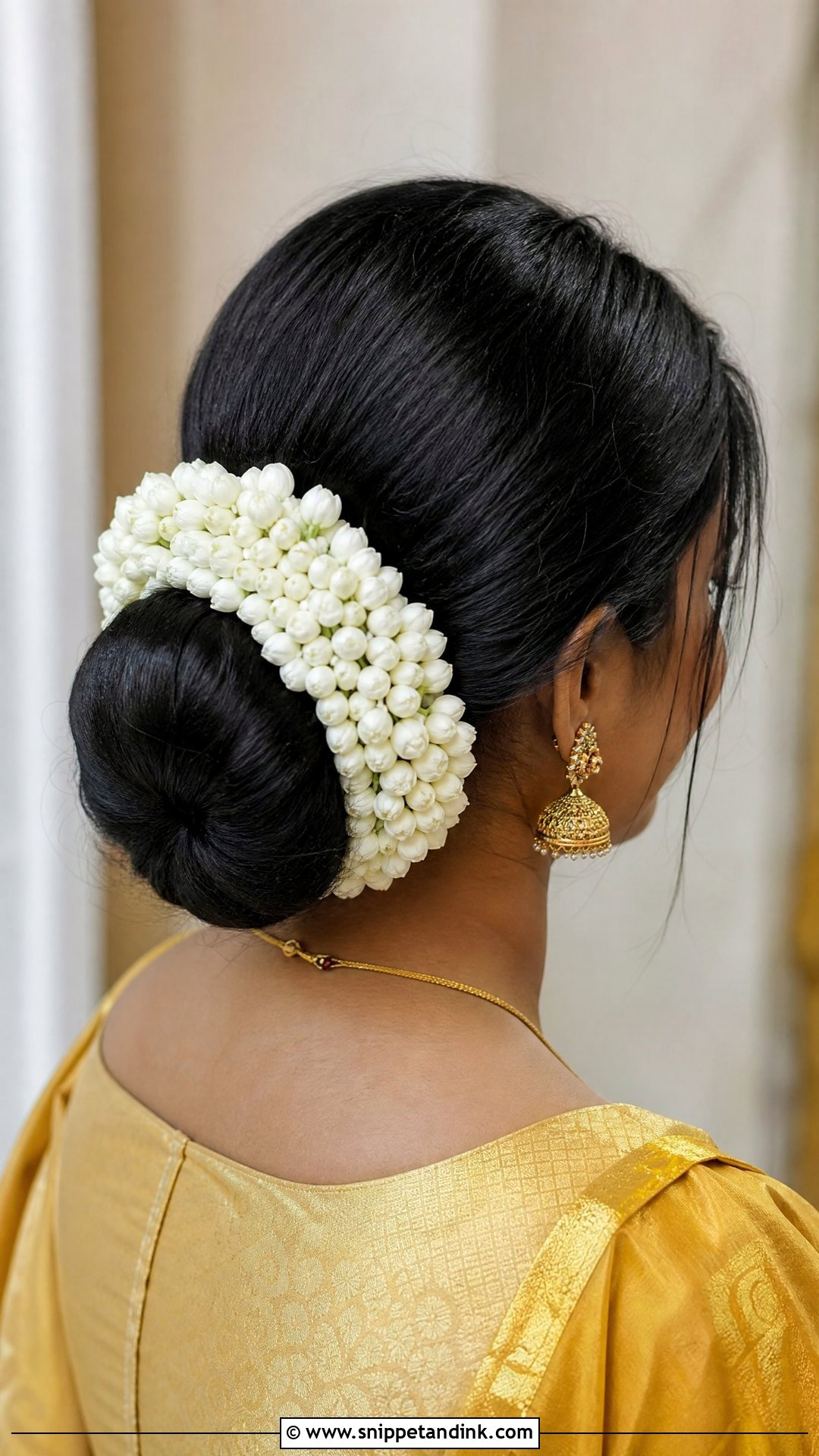 Jasmine Gajra Low Bun - Snippet and Ink - 20 Tamil Wedding Hairstyle Ideas