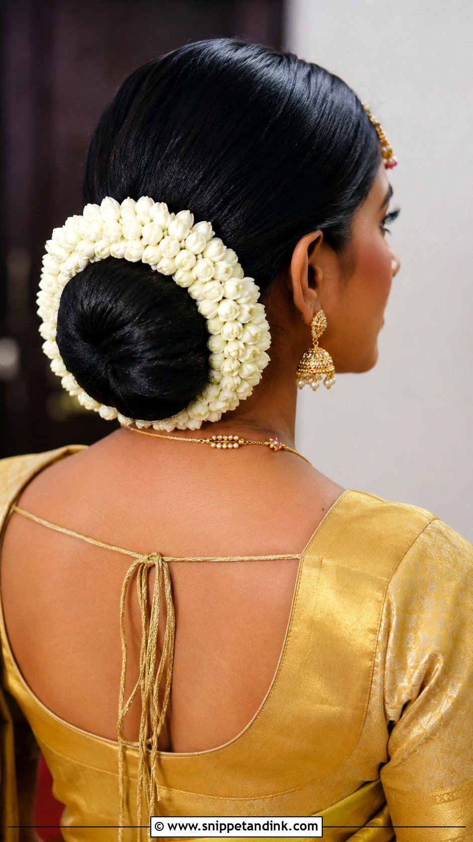 Jasmine Wrapped Low Bun - Snippet and Ink - 20 South Indian Bridal Wedding Hairstyles