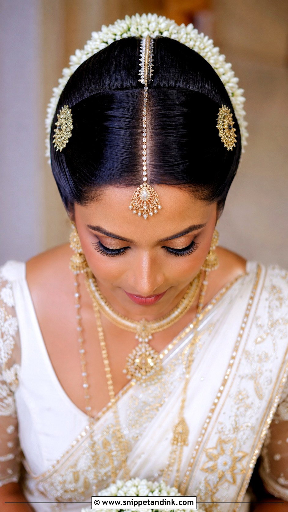 Kandyan Bridal Bun With Middle Part - Snippet and Ink - 15 Kandyan Bridal Hairstyles
