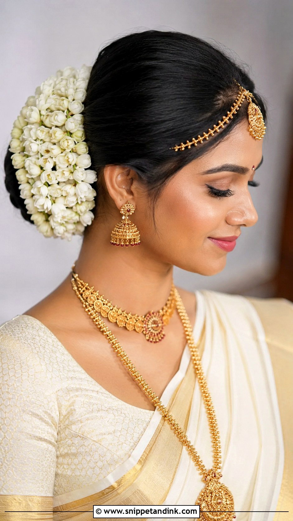 Kerala Bridal Bun With Jasmine - Snippet and Ink - 15 Kerala Bridal Hairstyles