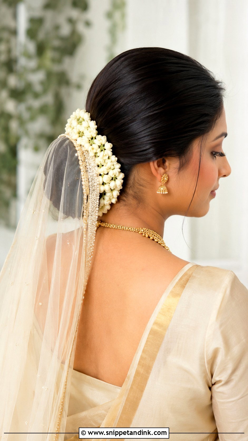 Kerala Bridal Low Bun With Veil - Snippet and Ink - 15 Kerala Bridal Hairstyles