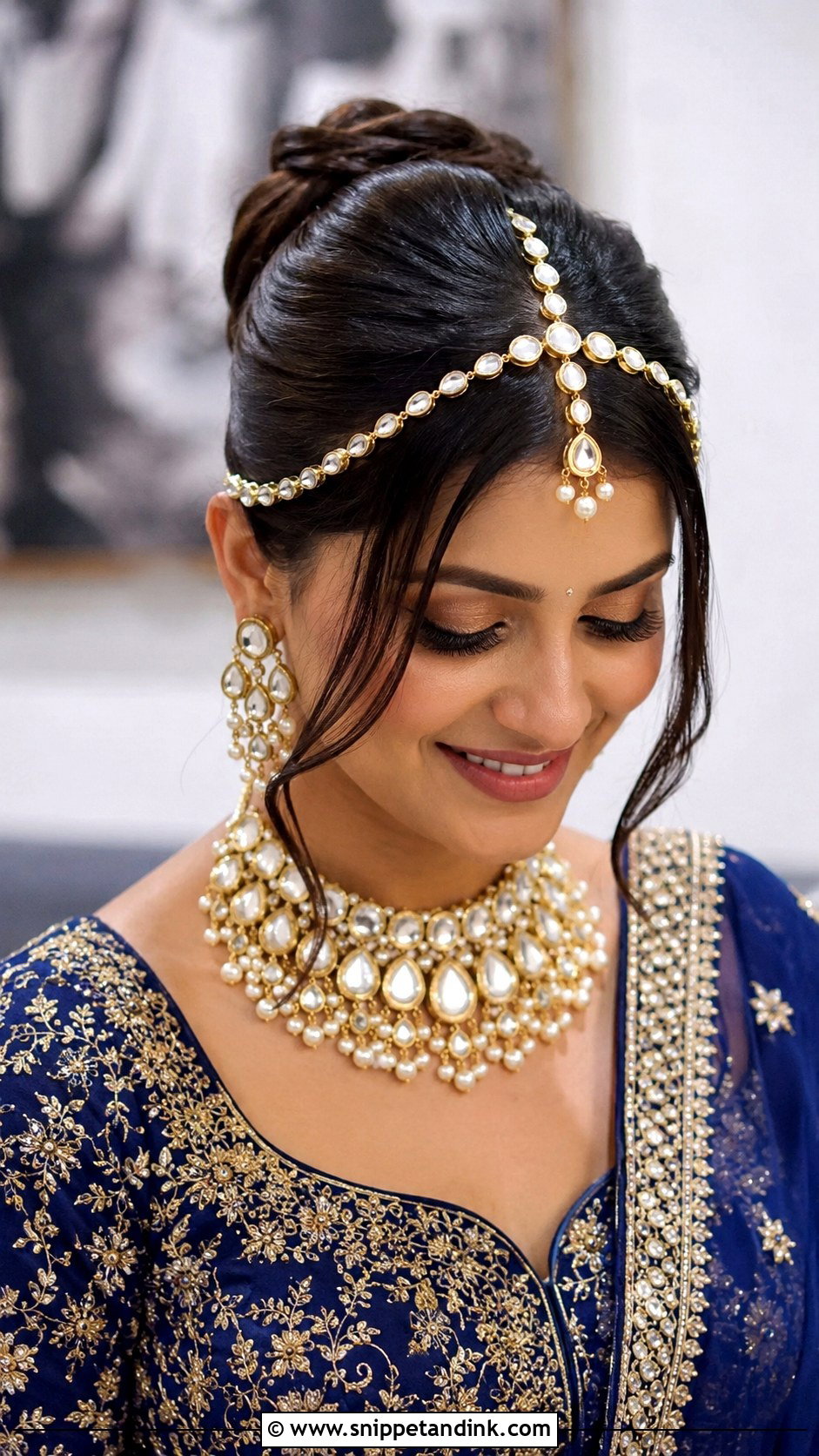 Knotted Bun With Matha Patti - Snippet and Ink - 25 Indian Wedding Hairstyle for Chubby Face Ideas